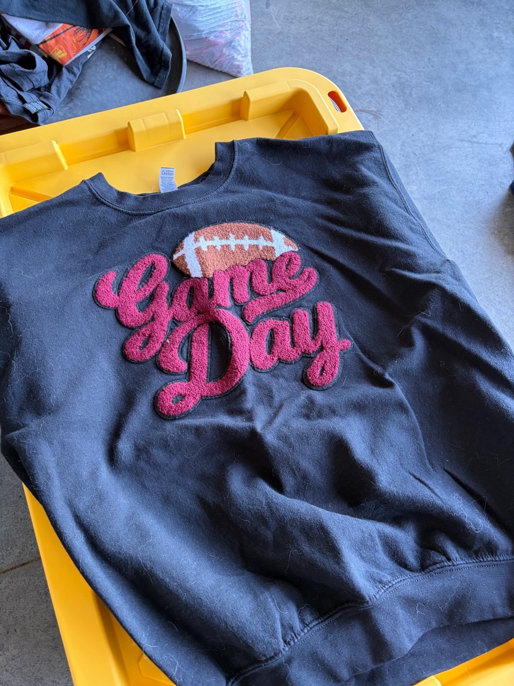 FOOTBALL 🏈 SEASON IS IN 
Women's Black "Game Day" Football Appliqué Sweatshirt